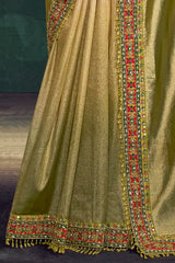 Gold saree skirt with textured pleats and multicolor border trim.