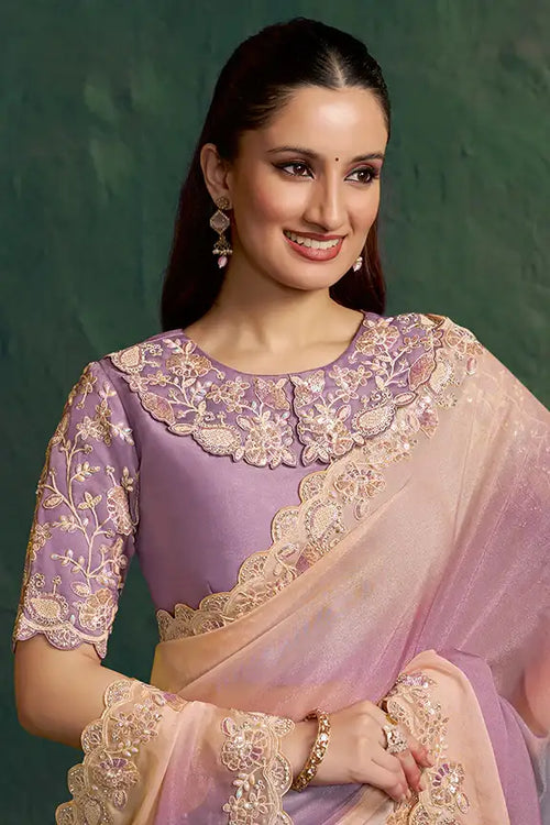Lavender silk saree with ornate gold embroidery on bodice and draped pallu