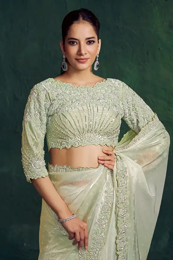Mint sage saree with scalloped neckline blouse and embellished pallu, long sleeves