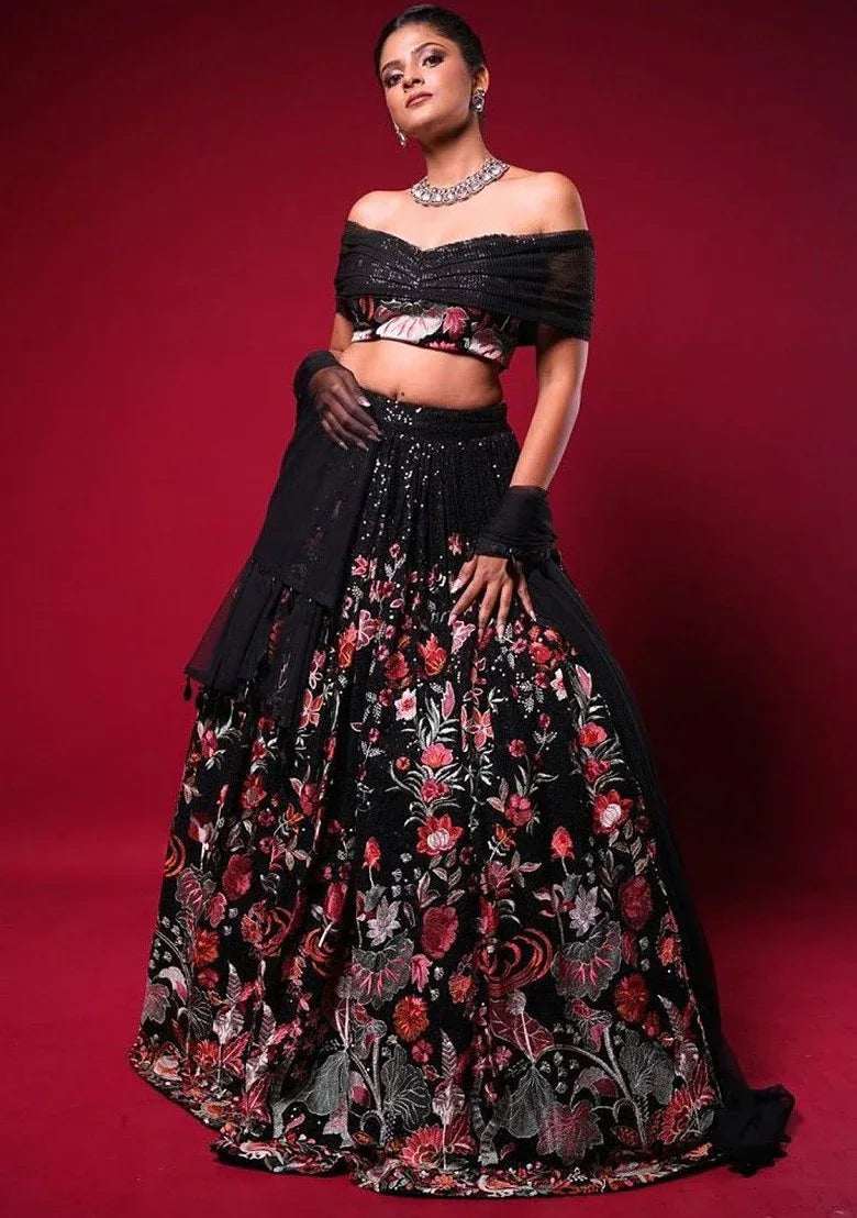 Black off-shoulder sequin embroidered blouse with floral lehenga skirt set