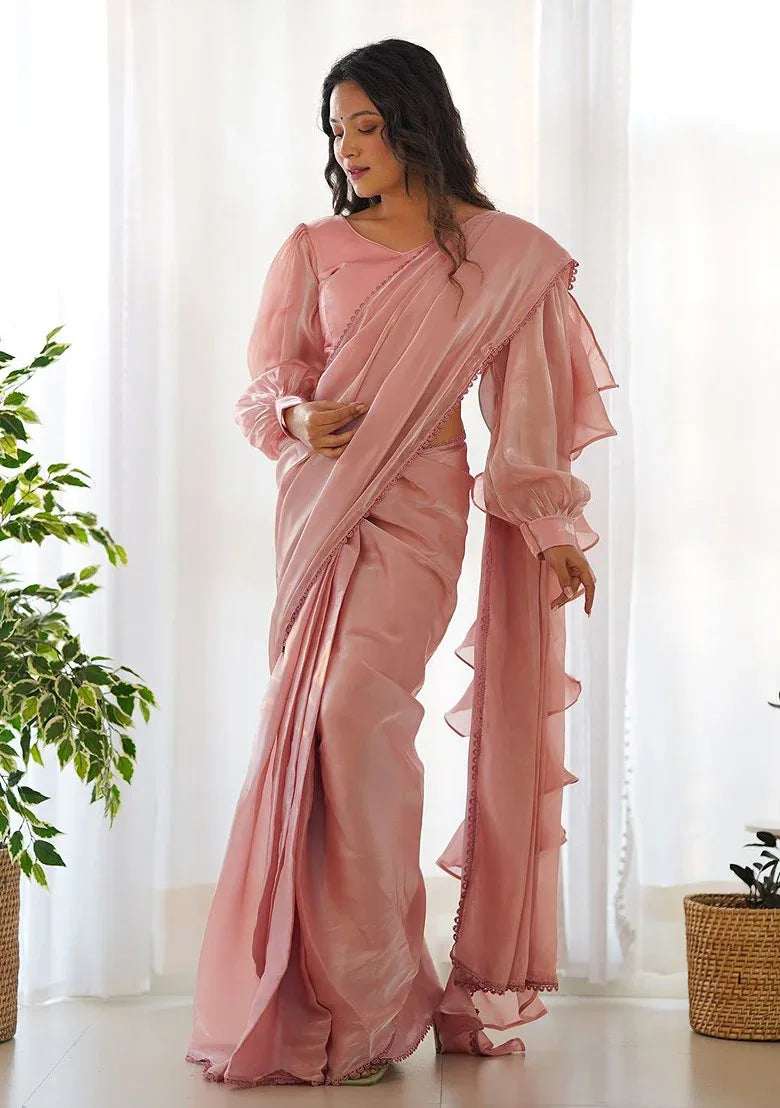 Dusty peach ruffle saree with draped front and scalloped hem ruffle trim