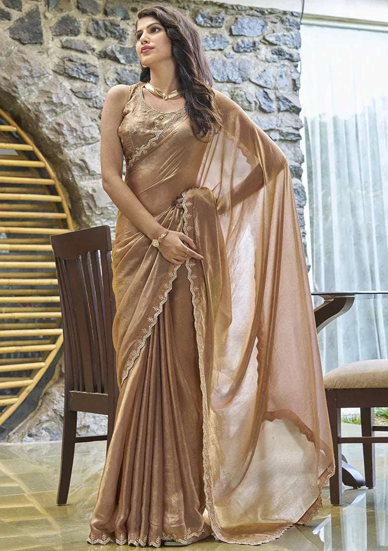 Champagne gold satin silk saree with embroidered front panel and open pallu