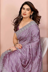 Lavender twill net saree with embellished pallu and silver-toned border