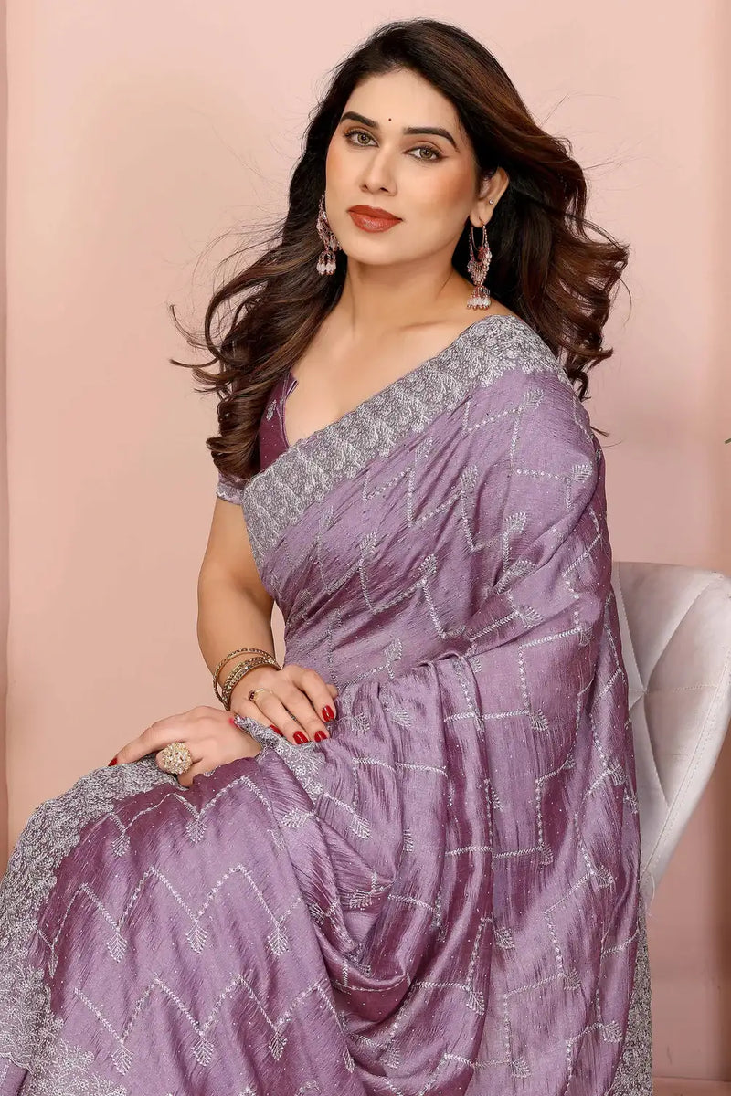 Lavender twill net saree with embellished pallu and silver-toned border