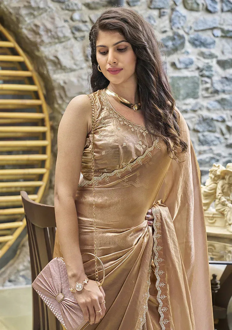 Champagne gold satin silk saree close-up of beadwork neckline and decorative border