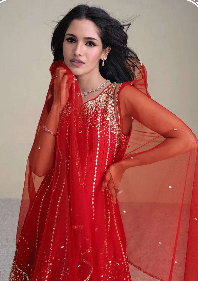 Red silk Anarkali dress with bead-and-sequin embroidery and sheer red dupatta