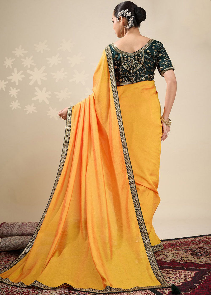 Nayoora Mustard Yellow Vichitra Saree with Emerald Green Embroidered Art Silk Blouse