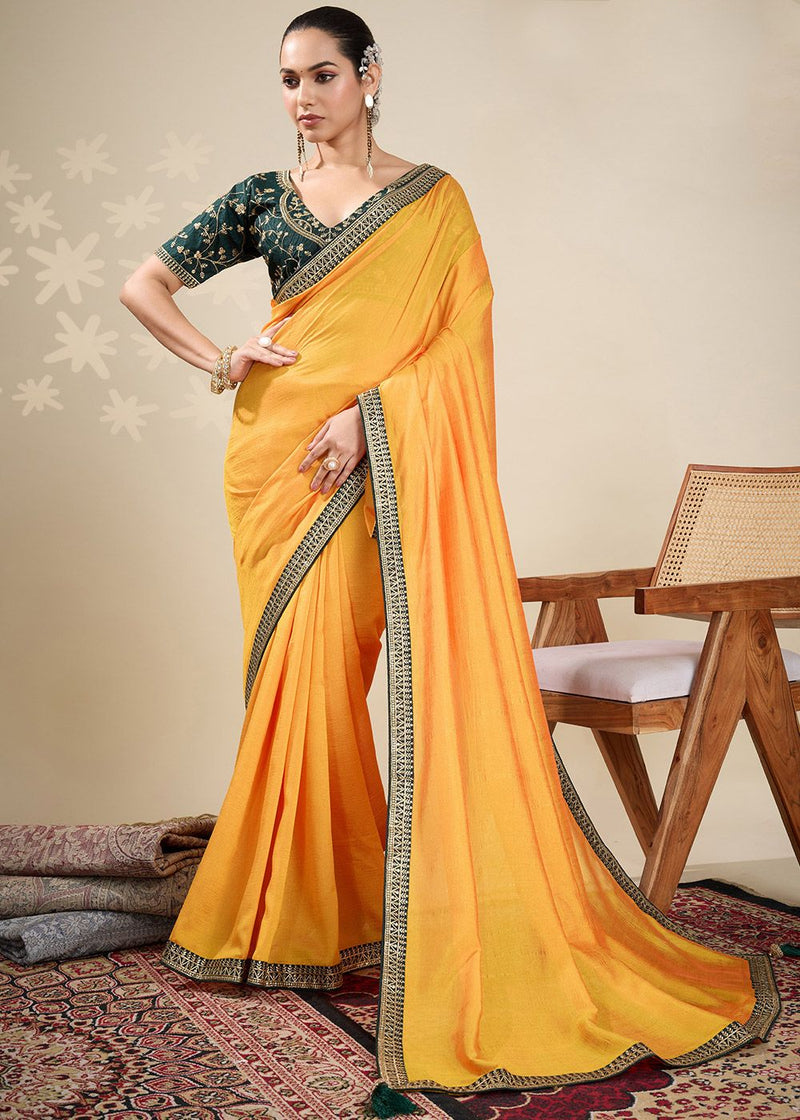 Nayoora Mustard Yellow Vichitra Saree with Emerald Green Embroidered Art Silk Blouse