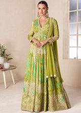 Green floral Anarkali gown with V-neck, long sleeves, and gold trim, full-length flare