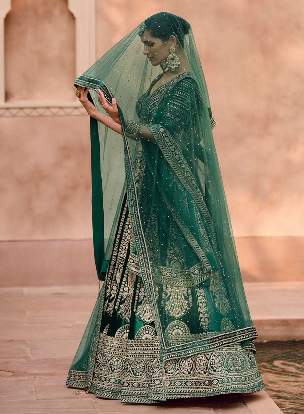 Nayoora Heritage Emerald Velvet Hand-Embellished Bridal Lehenga