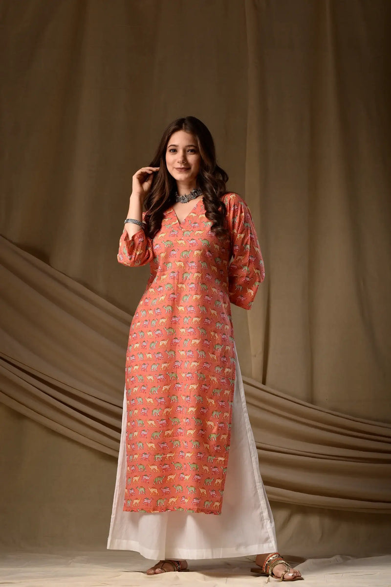 Coral printed rayon kurti with round neckline and white hem trim
