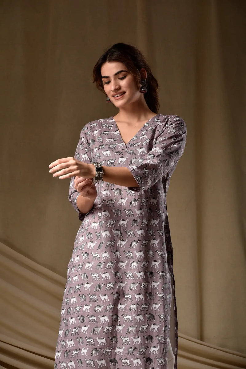 Mauve printed rayon kurti with V-neck and 3/4 sleeves, animal motif pattern