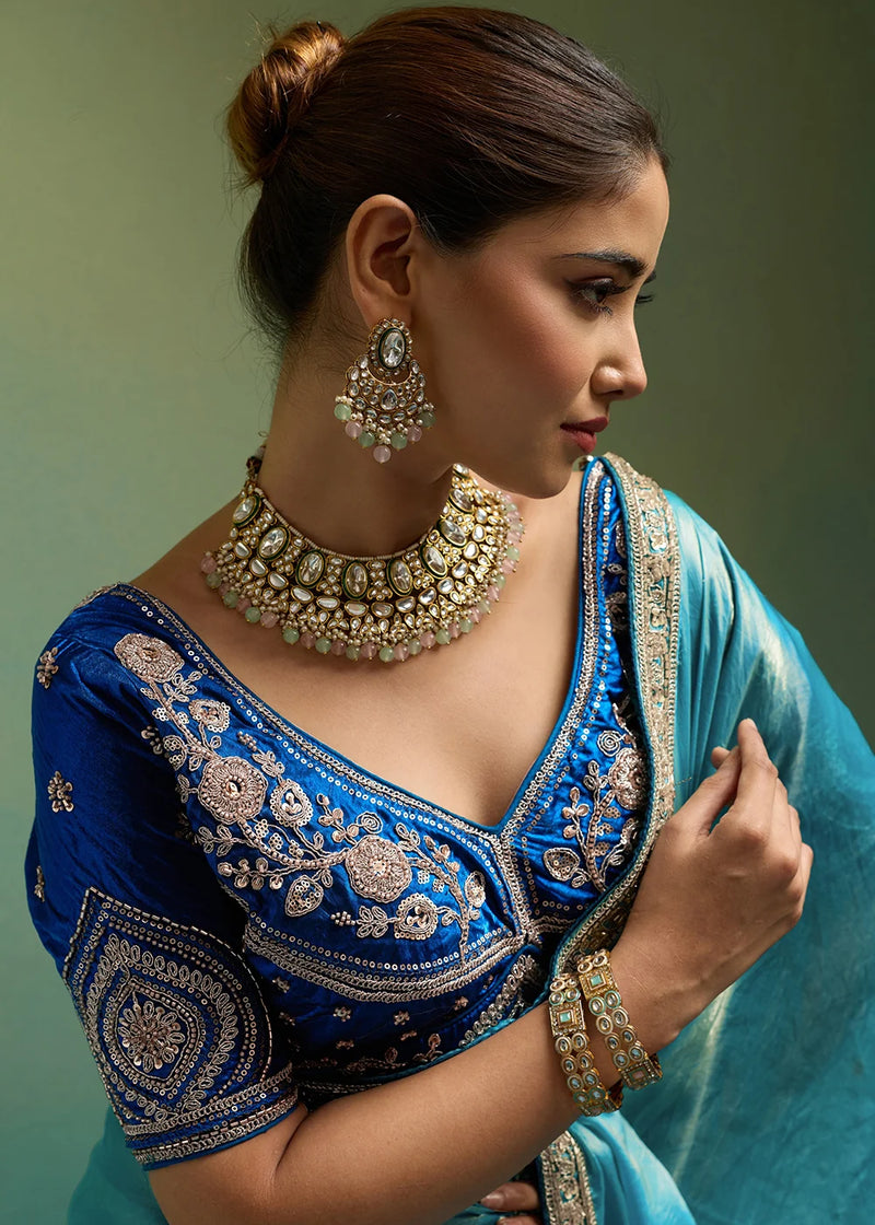 Nayoora Turquoise Blue Velvet Satin Embroidered Designer Saree