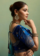 Nayoora Turquoise Blue Velvet Satin Embroidered Designer Saree