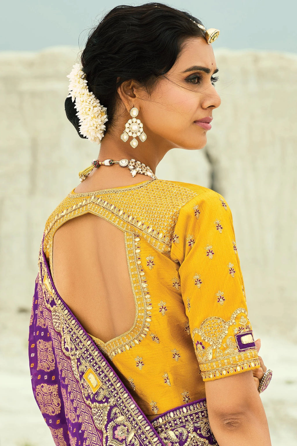 Nayoora Royal Purple Georgette Woven Saree with Mustard Embroidered Blouse
