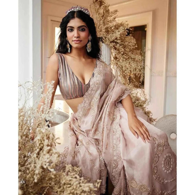 Blush pink saree with gold sequin embroidered pallu and motifs, V-drape on model