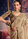 Golden beige zari tissue embroidered saree