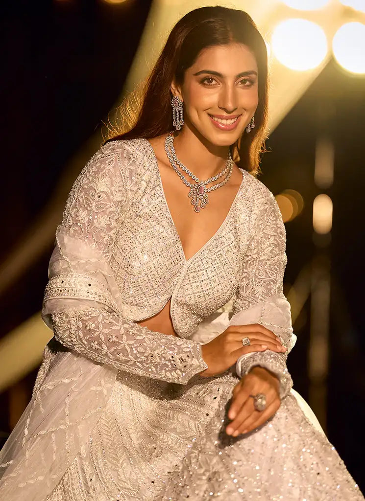 Nayoora Riyaasat Silver Swarovski Net Lehenga