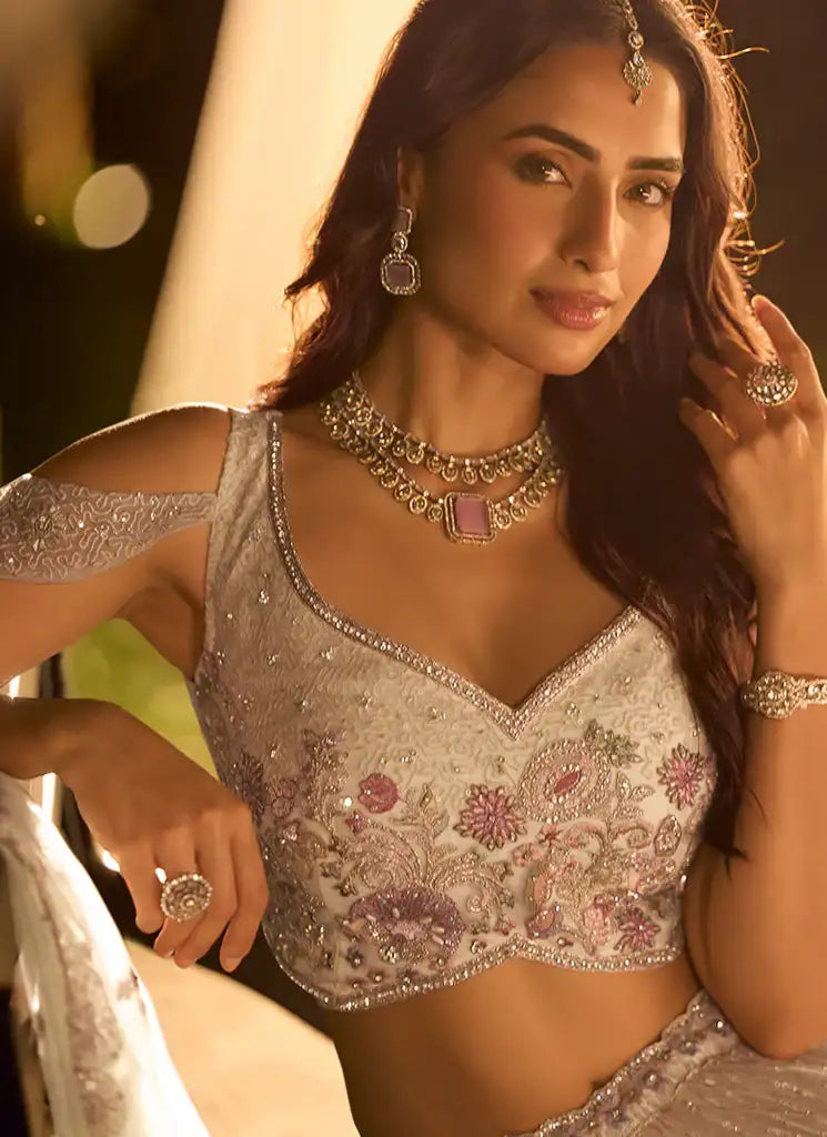 Lavender embellished V-neck blouse with beadwork and matching lehenga skirt