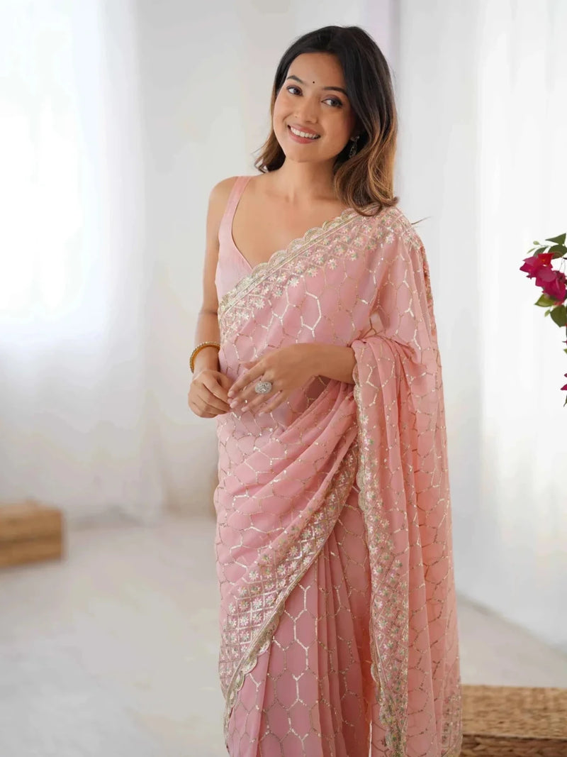 Blush pink georgette sequin jaal saree with sequin mesh texture and bordered pallu