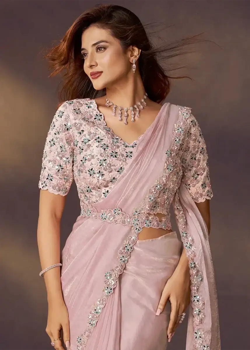 Blush pink ready-to-wear saree with floral-embroidered blouse and jeweled border