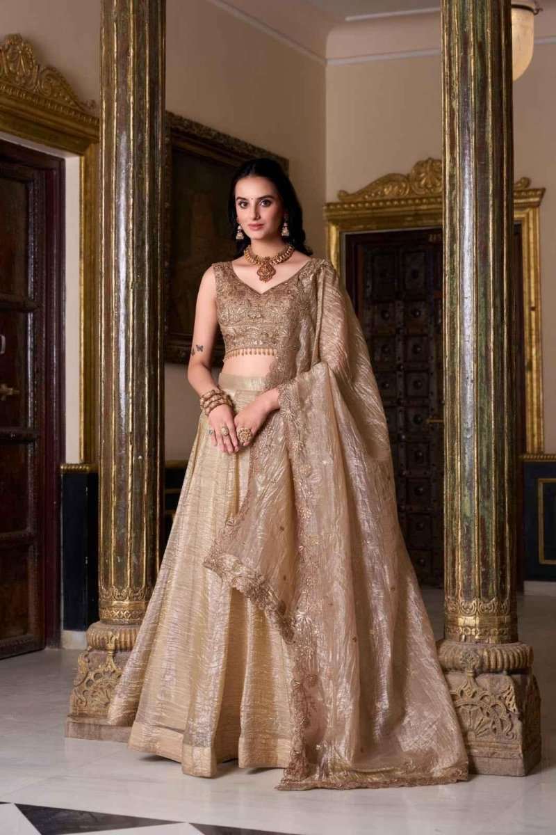 Beige-gold embellished lehenga set with matching blouse and long dupatta