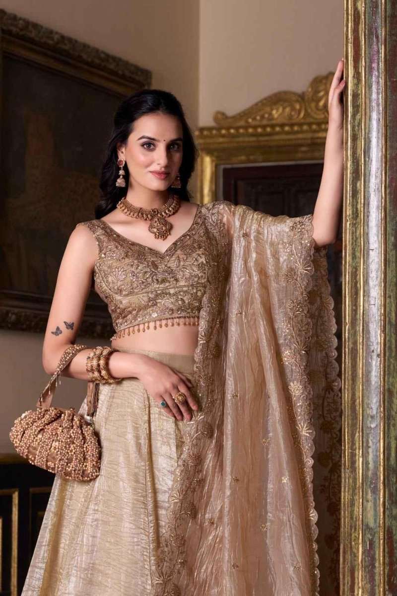 Beige-gold embroidered blouse with lehenga skirt and sheer dupatta drape