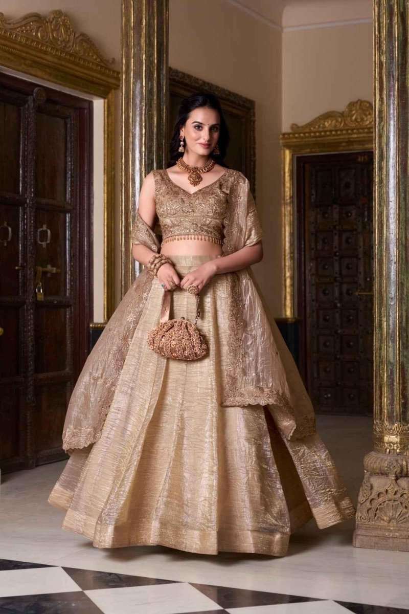 Gold embroidered bridal lehenga with matching sleeveless blouse and draped dupatta