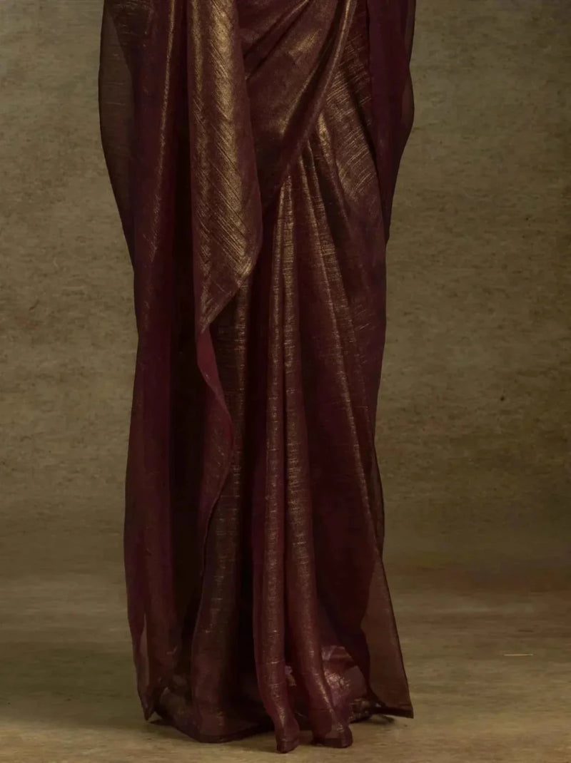 Dark brown satin chiffon saree fabric with gold shimmer, pleated lower drape