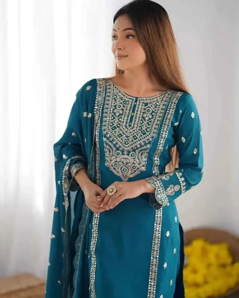Teal embroidered kurta with gold motifs, keyhole neckline, contrast trim