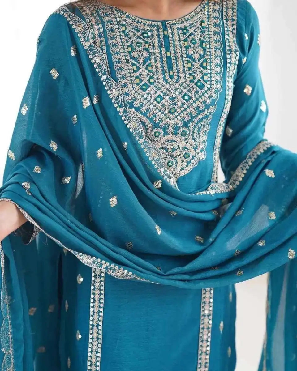 Teal embroidered dupatta with gold motifs and border trim, close-up drape