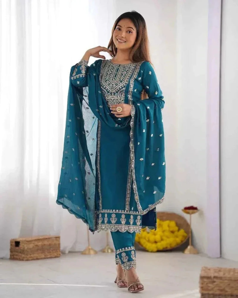 Embroidered kurta and palazzo set in teal with matching dupatta, full-length view