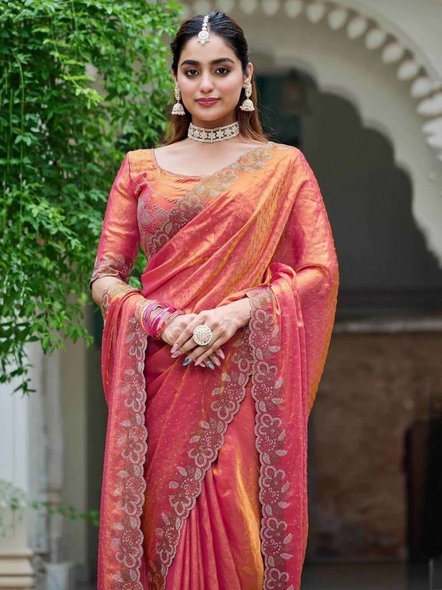 Coral rose silk saree with intricate diamond work on the pallu and center drape