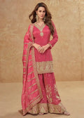 Pink silk salwar suit set with gold V-neck embroidery, long sleeves, and dupatta