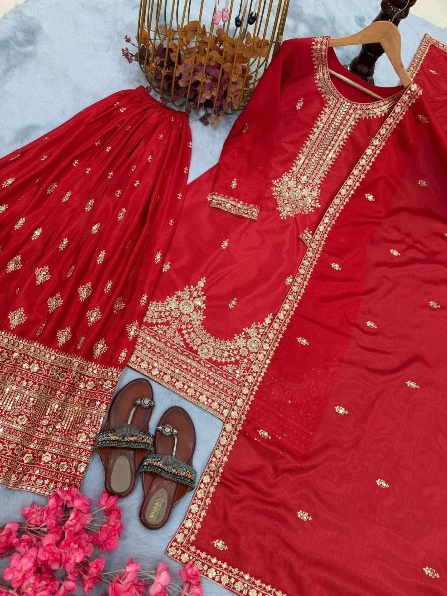 Crimson red embroidered kurta with wide border and matching palazzo pants
