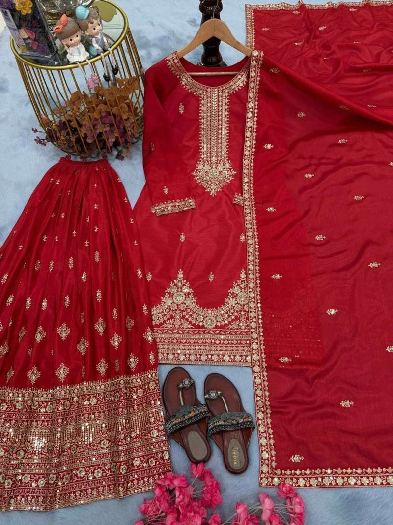 Crimson embroidered kurta with gold trim and V neckline, paired with flared palazzo pants