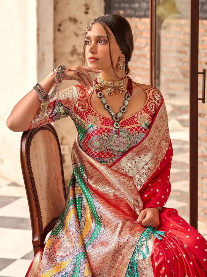 Crimson red silk wedding saree with detailed embroidered panel and multicolor accents