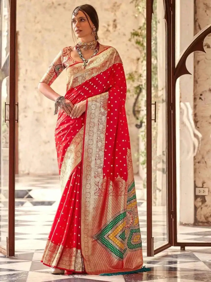Crimson red silk wedding saree with cream-gold border and multicolor geometric motifs