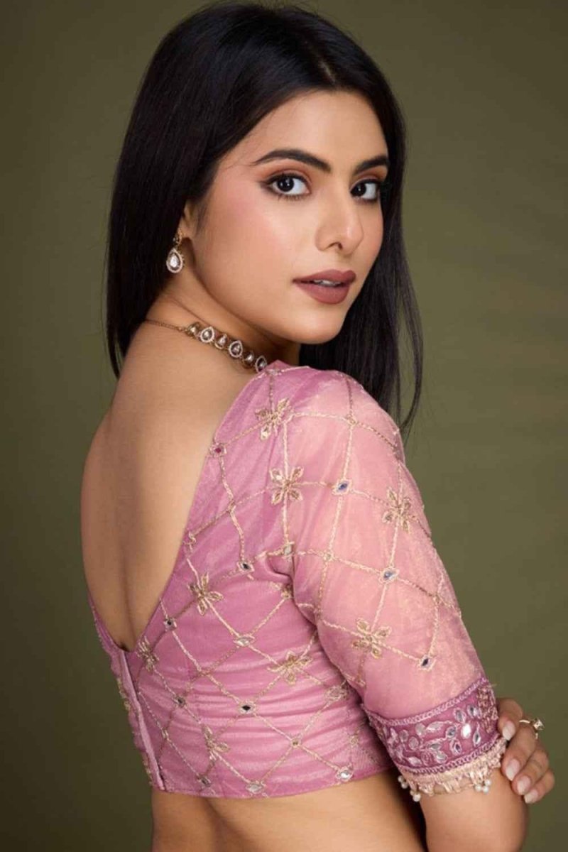 Dusty pink embellished saree blouse with gold-toned beaded sleeves and trim