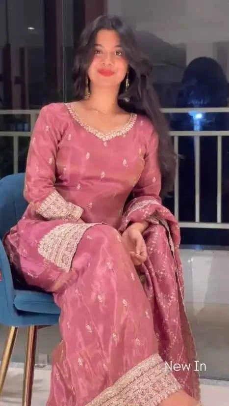 Dusty pink sequin palazzo suit with scalloped neckline and lace cuffs, full length
