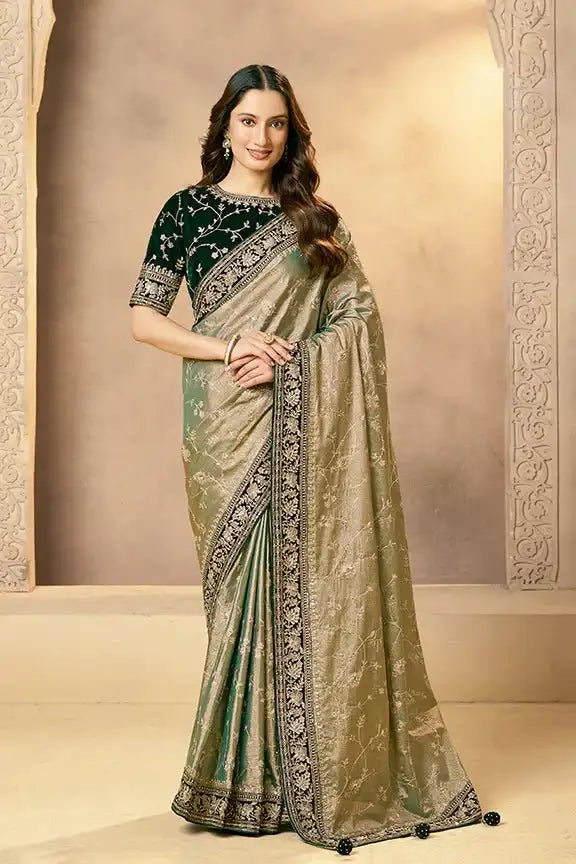 Emerald green and gold kora zari tissue silk saree with ornate zardozi border