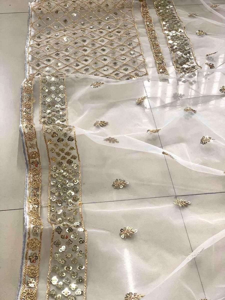Ivory net saree fabric with gold sequin strip border and net overlay