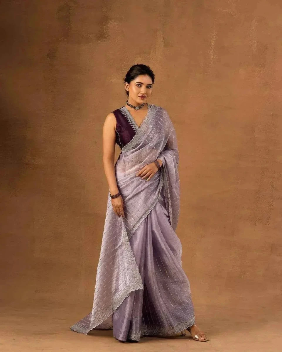 Lavender soft saree with zari and sequin embroidery, full-length draped view
