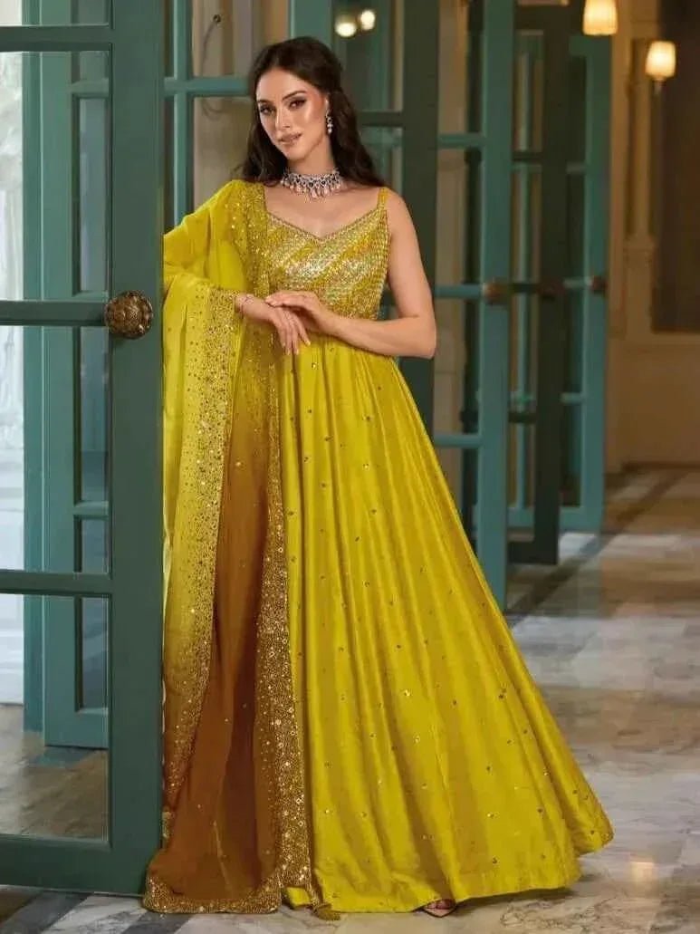 Lime yellow anarkali suit with sequin yoke and flowing organza dupatta, sleeveless V-neck maxi
