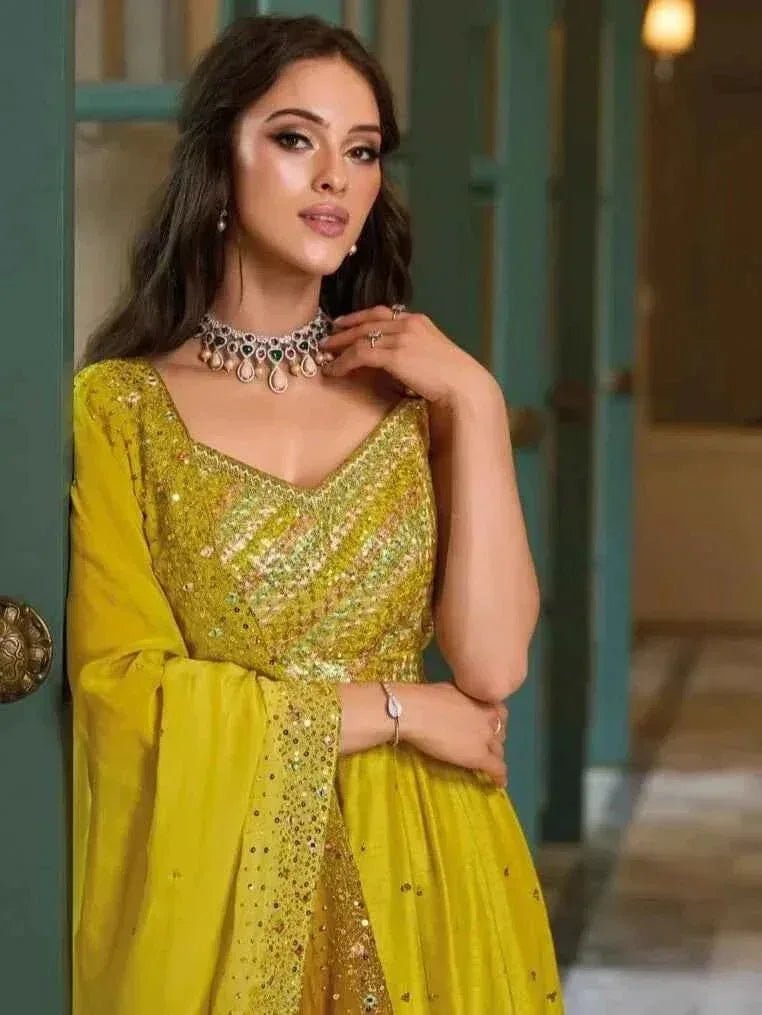 Lime yellow anarkali dress with heavy sequin yoke detail and gathered skirt, sleeveless V-neck