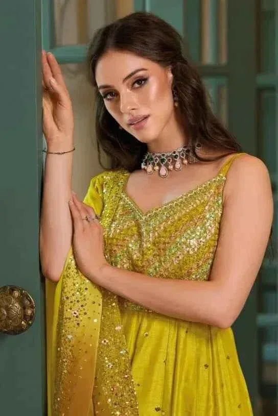 Lime yellow sleeveless anarkali suit with sparkling sequin V-neck yoke and layered skirt