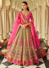 Rani pink lehenga with antique gold mirror work, flared skirt and sheer dupatta