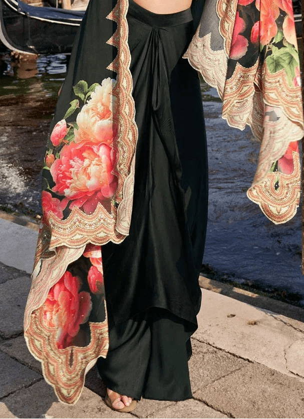 Black draped dhoti set with floral cape, scalloped ornate border and long sleeves