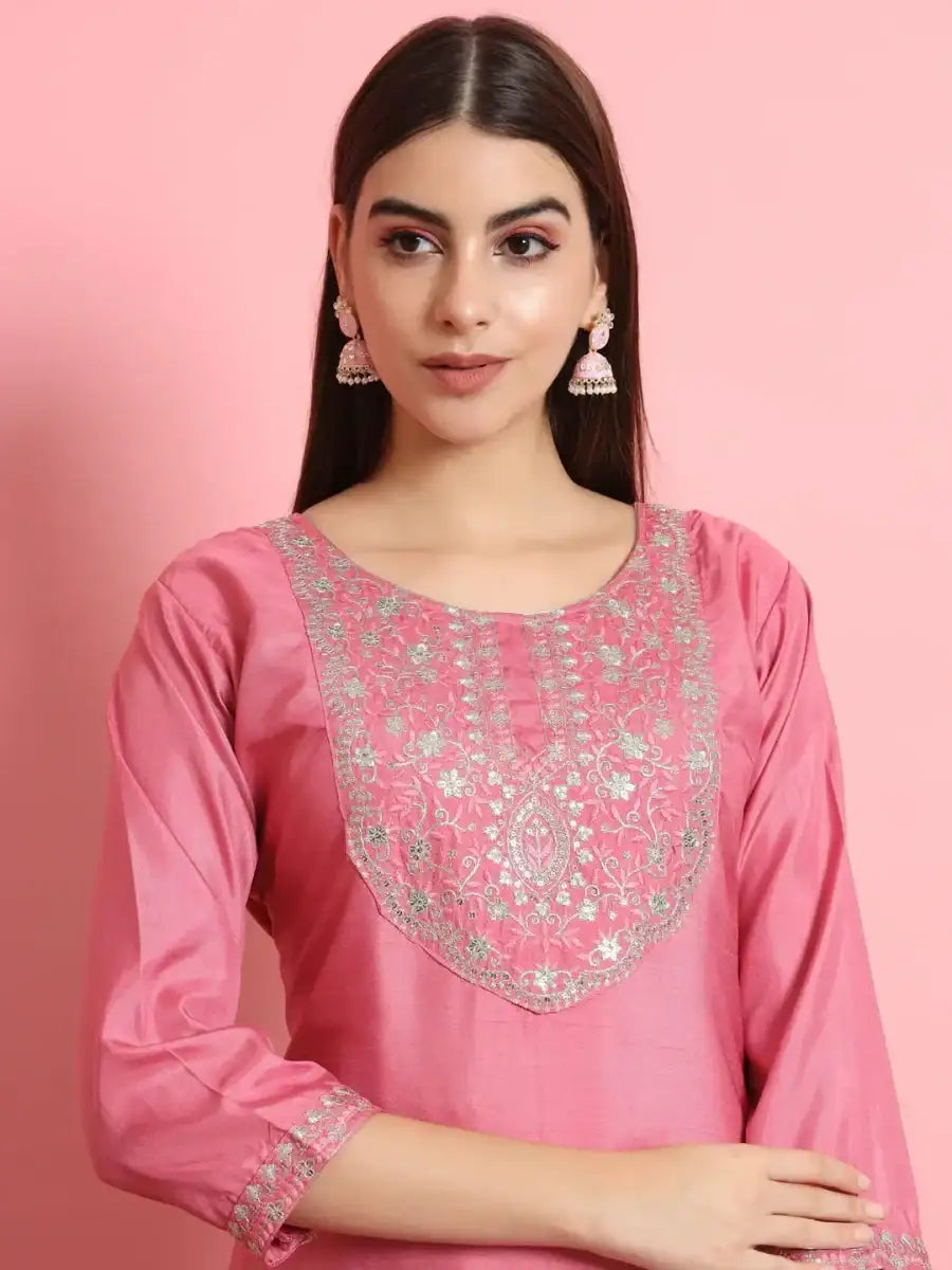 Bright pink embroidered kurti front with scoop neckline and three-quarter sleeves