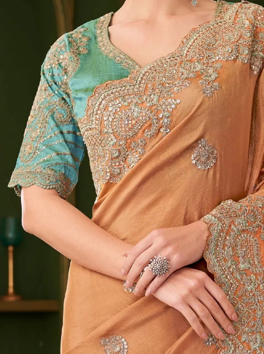 Nayoora Luxe Burnt Orange Embroidered Georgette Saree with Teal Blouse - Nayoora